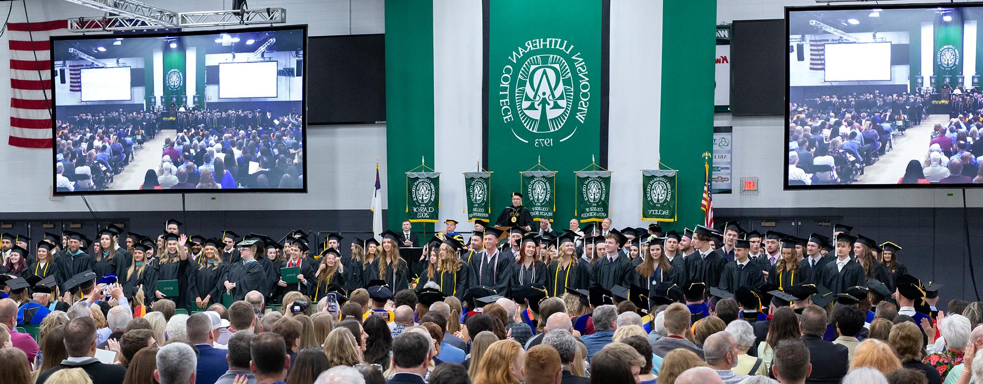 Students graduating in Time of Grace Center